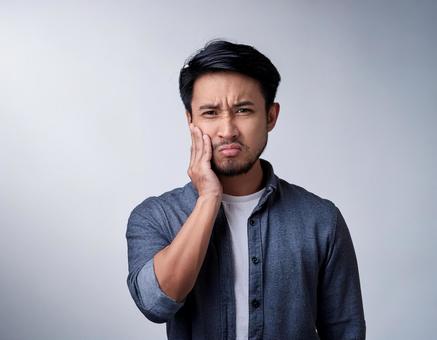 Man suffering from toothache, tooth ache, tooth decay, periodontal disease, JPG