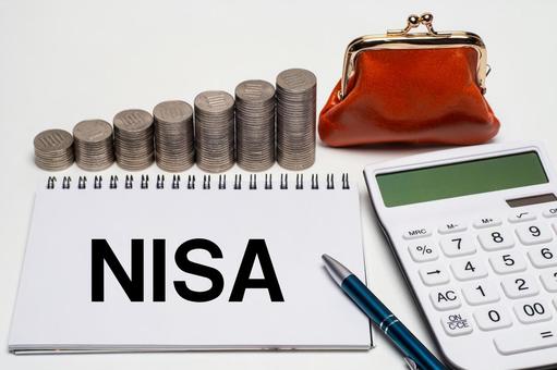 がま口財布と電卓とコインでNISA 貯金,金融,貯蓄の写真素材