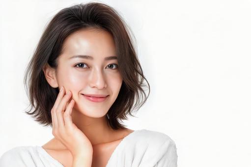 頬に手を当て微笑む若いボブヘアの女性 頬に手を当て微笑む若いボブヘアの女性の写真