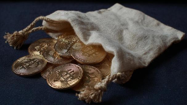 デジタルゴールド:ビットコインと麻袋 デジタルゴールド:ビットコインと麻袋の写真