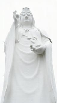 Sendai Daikannon statue praying for peace seen from below, JPG