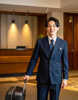 働く人・ホテルマン・お荷物お運びします 働く人・ホテルマン・お荷物お運びしますの写真