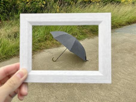 写真フレームにおさまる傘 傘,梅雨,雨の写真素材