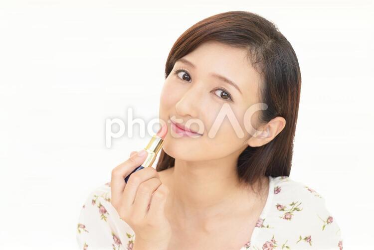 メイクアップをする女性 メイクアップ,女性,女の写真素材