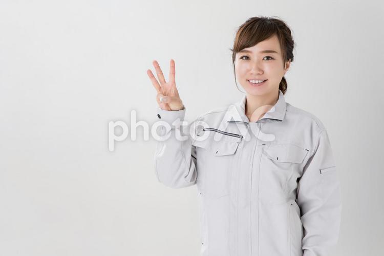 作業服をきたビジネスウーマン 3,作業服,女性の写真素材