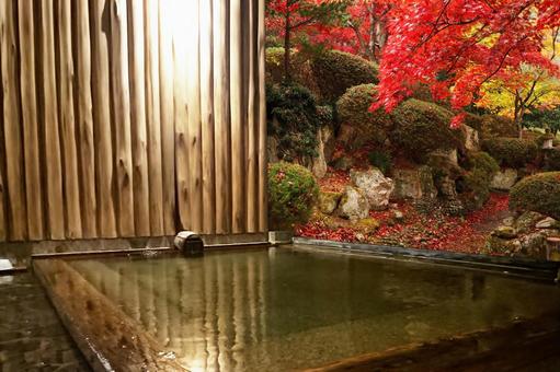 Open-air bath in the autumn leaves Open-air bath in the autumn leaves