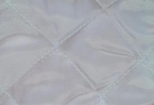 白いキルティング生地のアップ キルティング,テクスチャ,背景の写真素材