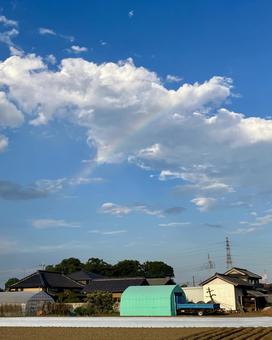 雲をかける虹の風景 雲をかける虹の風景 虹,景色,風景の写真素材
