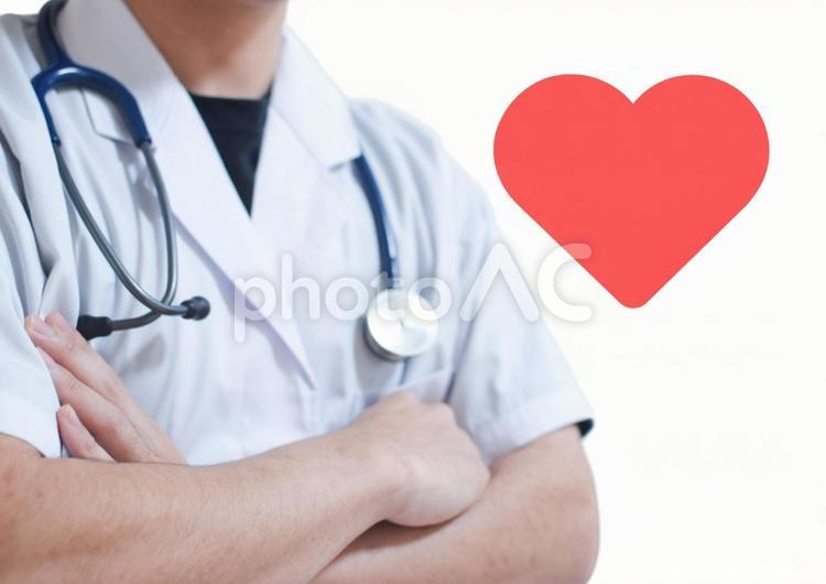 腕組みする白衣の男性とハート 医者,医師,聴診器の写真素材