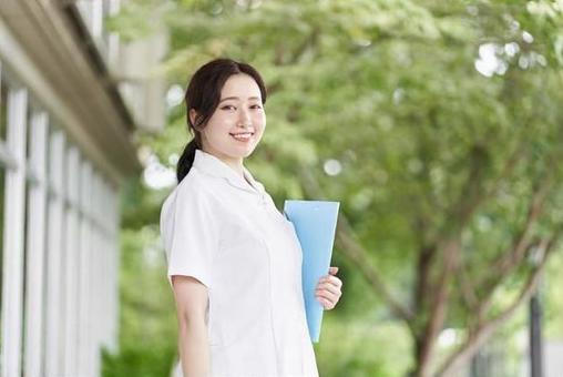 Nurse standing with a smile on a green background, nurse, nurse, nurse, JPG