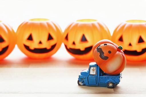 ハロウィンのカボチャを配ってまわります ハロウィンのカボチャを配ってまわりますの写真