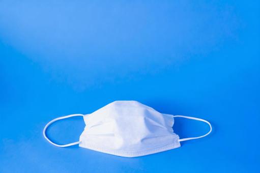 Simple mask on blue background, JPG Simple mask on blue background, JPG
