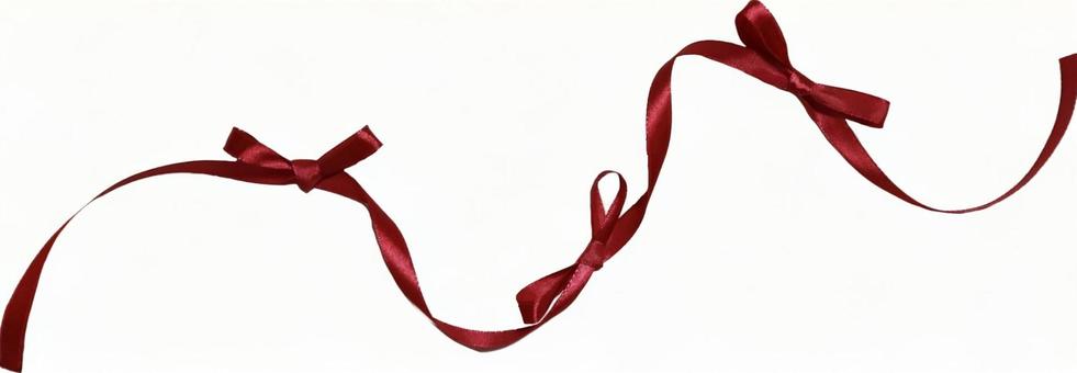 赤リボンの飾りの写真