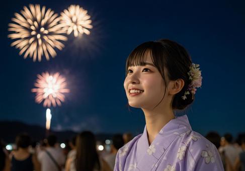 花火を見る浴衣女性 花火を見る浴衣女性の写真
