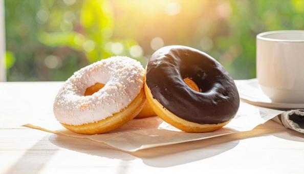 陽だまりの中のドーナツの写真