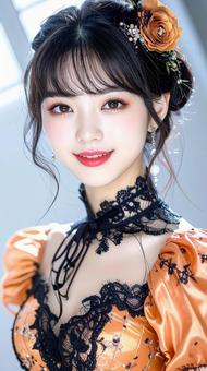 ハロウィンの仮装 女性 オレンジ色ドレス ハロウィンの仮装 女性 オレンジ色ドレスの写真