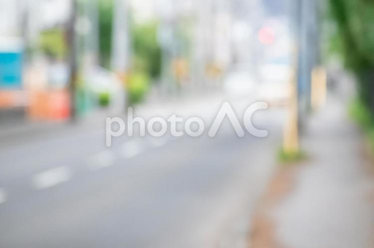 道路と町並みのボケ背景 ボケ背景,ボカシ,アウトフォーカスの写真素材