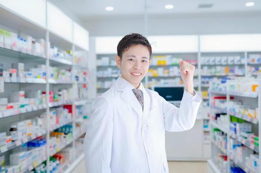 ガッツポーズする医療男性 ドラックストア,薬剤師,男性の写真素材