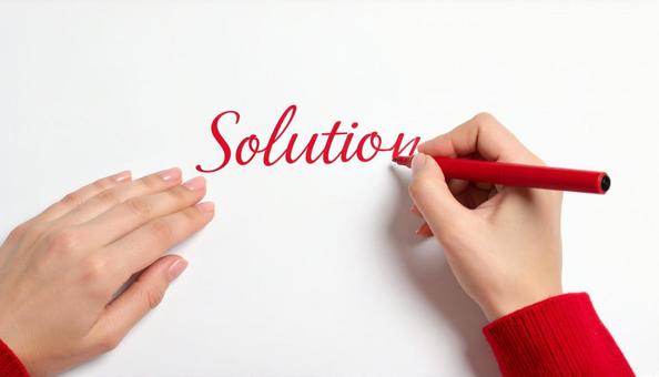 文字「Solution」と赤ペンで書く 文字「Solution」と赤ペンで書くの写真