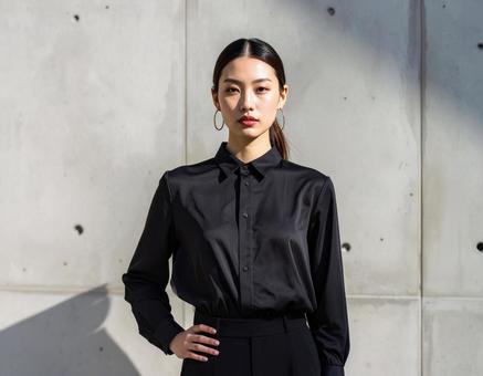 黒い服を着た女性モデル 黒い服を着た女性モデルの写真