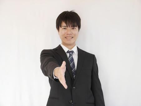 20's man businessman shaking hands 20's man businessman shaking hands