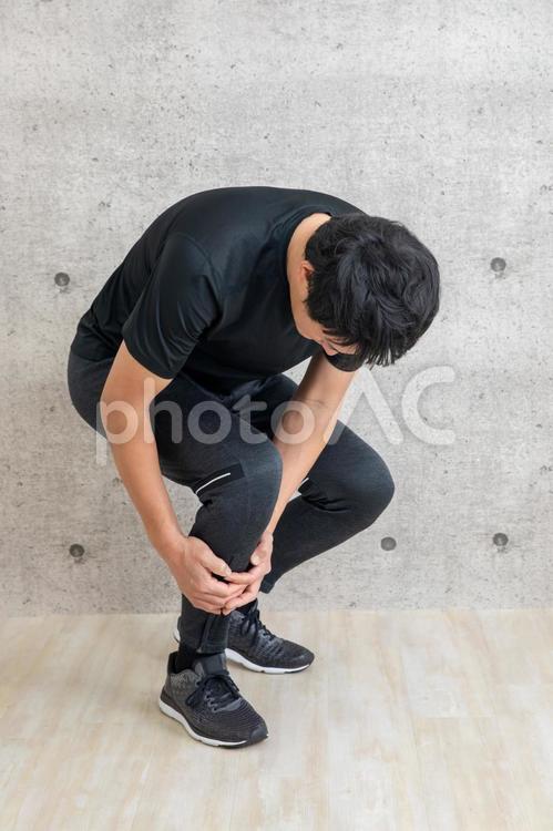 スポーツウェアを着た男性 スネ,脛,すねの写真素材
