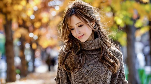 紅葉を背景に微笑む上品な若い女性 紅葉を背景に微笑む上品な若い女性の写真