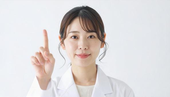 指をさす女医 指をさす女医の写真