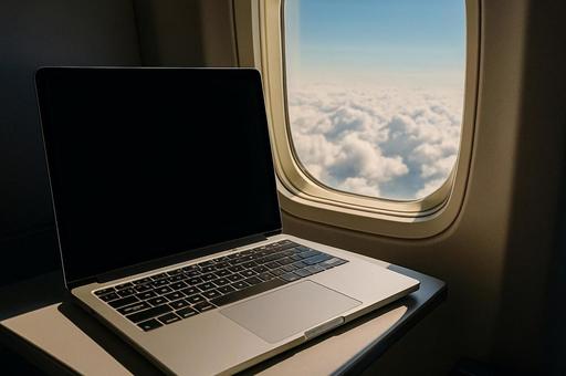 空の上でも仕事 空の上でも仕事の写真