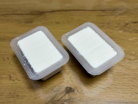 パックの豆腐 パックの豆腐の写真
