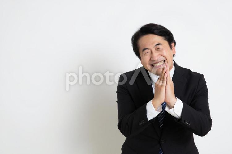無茶な頼み事をしている中年のサラリーマン男性（コピースペース） 中年,上司,会社員の写真素材