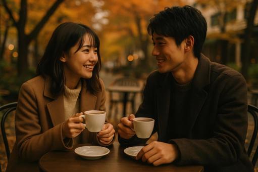 コーヒー片手に語らう二人 コーヒー片手に語らう二人の写真