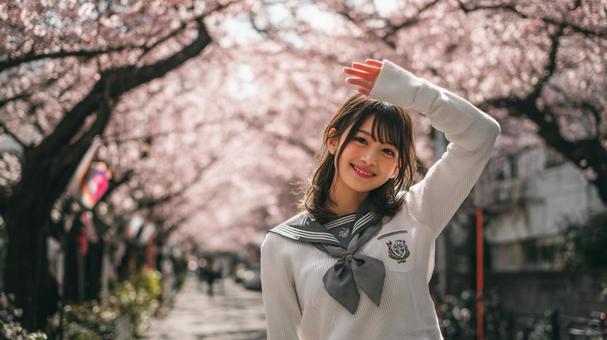 桜と微笑む女子高生 桜と微笑む女子高生の写真