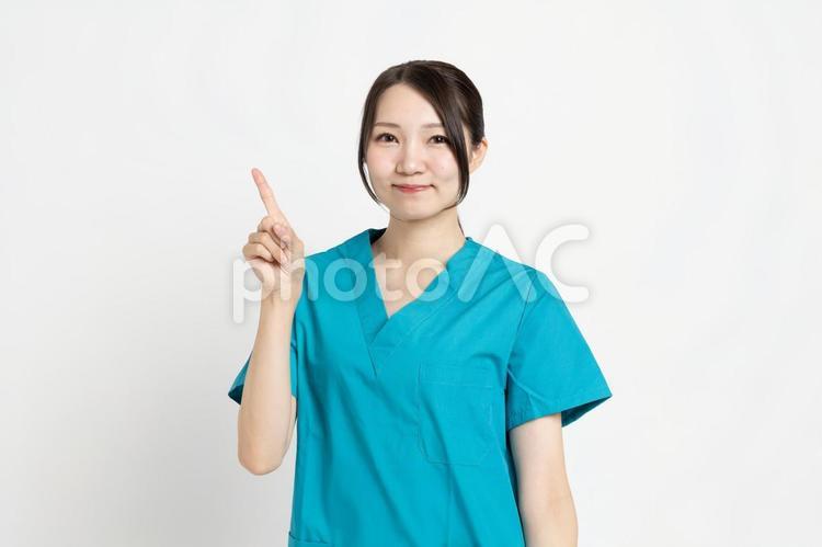 1本指を立てる女性の医者 医者,外科医,美人の写真素材