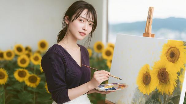 ひまわりの油絵を描く女性 ひまわりの油絵を描く女性の写真