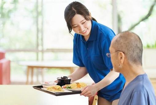 Caregiver serving the elderly, senior citizens, nurses, meal, JPG