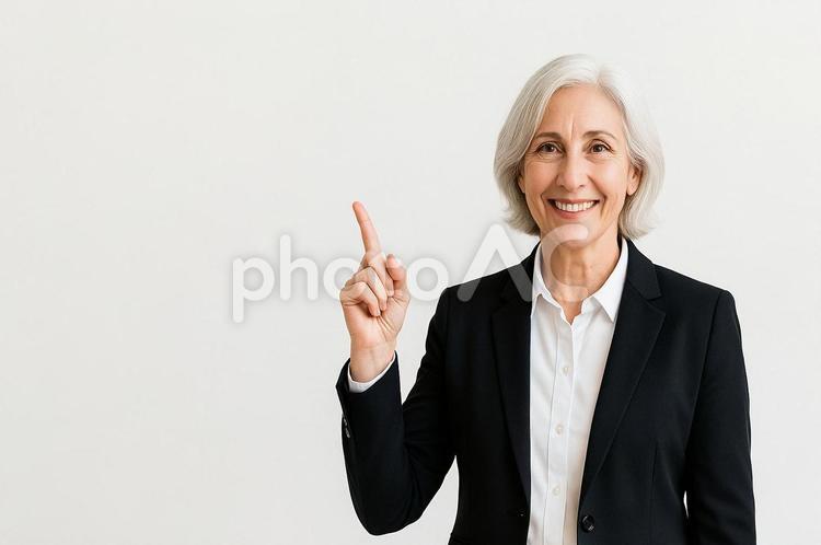 指を差してアドバイスをする人 女性,人物,ビジネスウーマンの写真素材