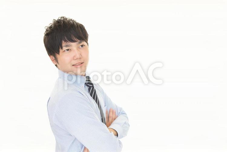 腕組みをする男性 男性,ビジネス,ビジネスマンの写真素材