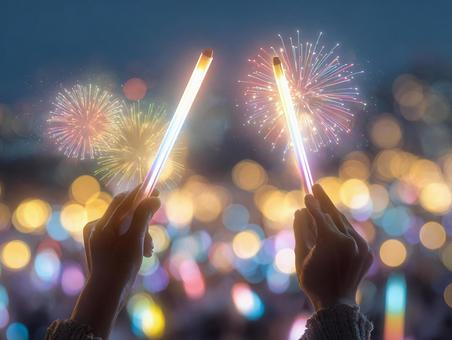 ライブ会場で花火を楽しむ観客 ライブ会場で花火を楽しむ観客 ペンライト,手,花火の写真素材