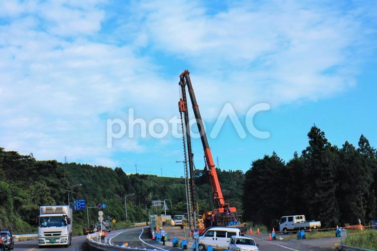 建設重機を使う大工事中 重機,道路,建設工事の写真素材