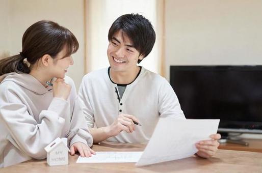 Asian couple thinking about buying a home Asian couple thinking about buying a home