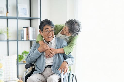 在宅介護の車椅子の夫婦 介護,シニア,夫婦の写真素材