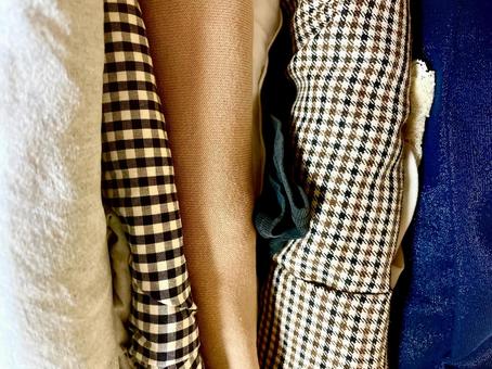 重なった色々な柄の布 布,素材,白の写真素材