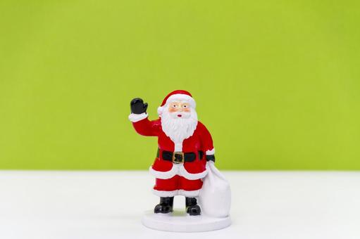 緑背景と可愛いサンタのクリスマス サンタクロース,クリスマス,フィギュアの写真素材