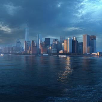 川に映る都市景観の写真