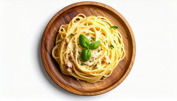 木製プレートに盛り付けられたパスタ 木製プレートに盛り付けられたパスタの写真
