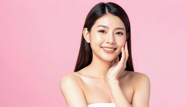 美容イメージの女性(ピンク背景) 美容イメージの女性(ピンク背景)の写真