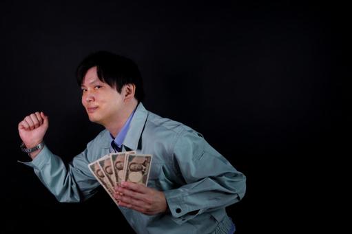 お金を持つ男性のポーズ お金を持つ男性のポーズ 男性,お金,千円札の写真素材