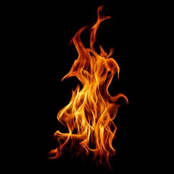 暖かさを感じさせる炎の背景の写真