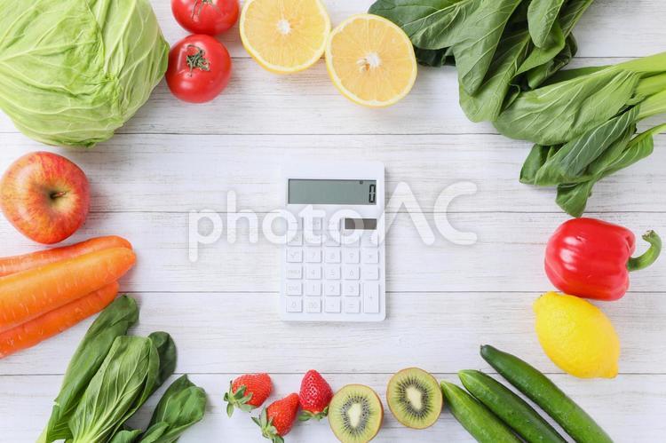 電卓と野菜 電卓,計算機,カロリーの写真素材